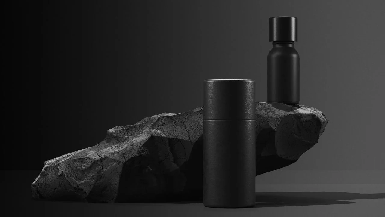 bottle of essential massage oil on stone beauty treatment minimal black design packaging mock up - Web Uniter